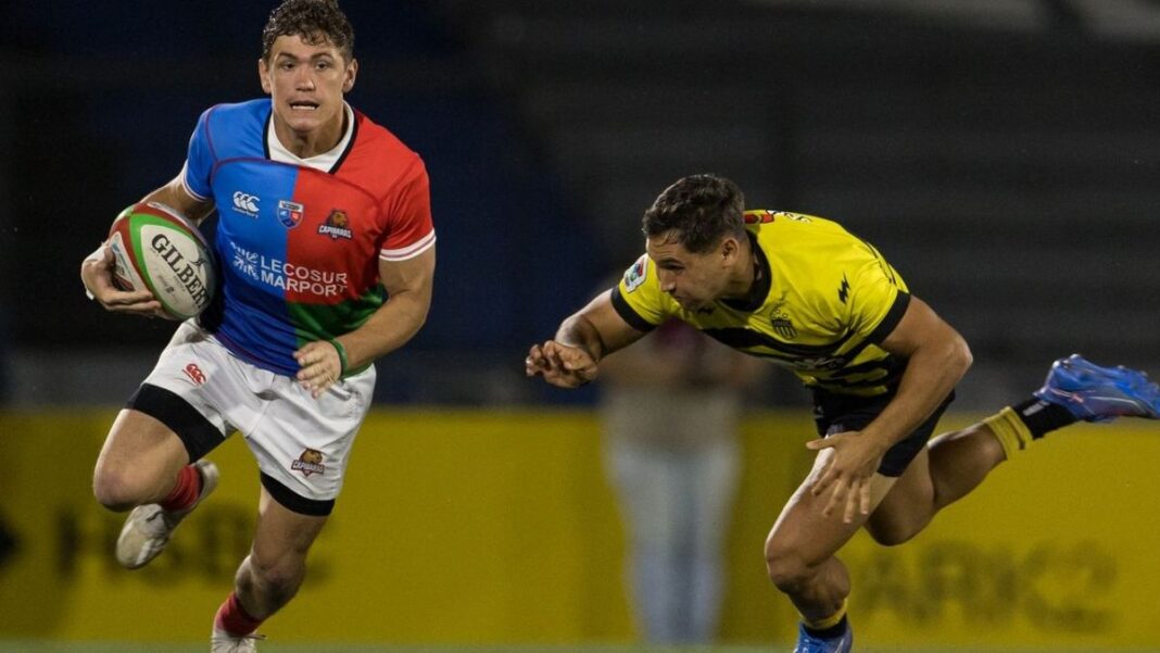 Jugadores de Capibaras XV celebrando un try durante el partido ante Peñarol en el Súper Rugby Américas.