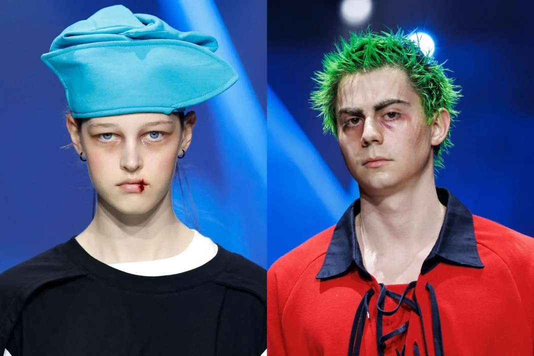 Diseños de Lucas Carrieri en la 080 Barcelona Fashion con líneas curvas y colores vibrantes