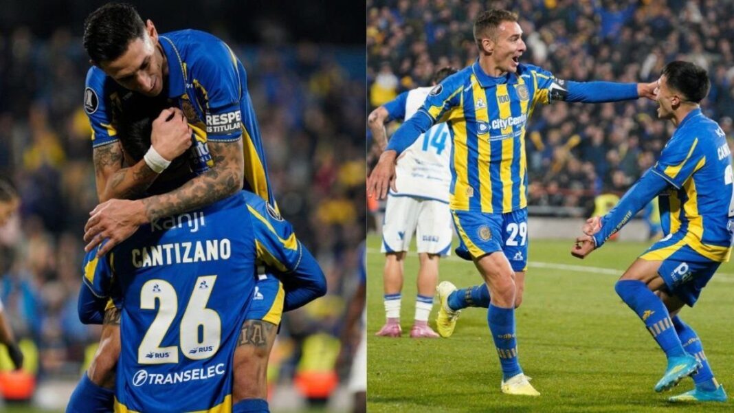 Giovanni Cantizano celebra con Marco Ruben tras el gol ante Universidad Central